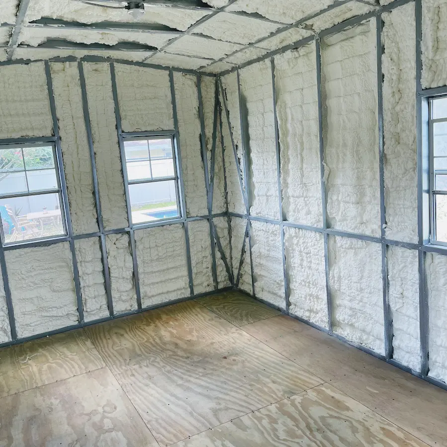 Closed-cell spray foam insulation applied to wall cavities in a residential project in Colusa